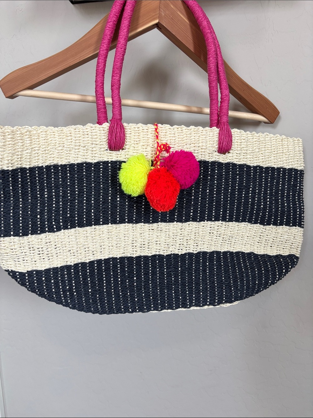 Striped Straw Tote with Hot Pink Handles and Pom Pom Accent